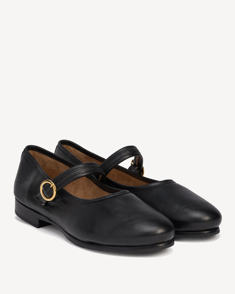 Pair of Mary Jane flats shown at a front angle. The Modern-Day Mary Jane Blackout. Sizes 5–12.