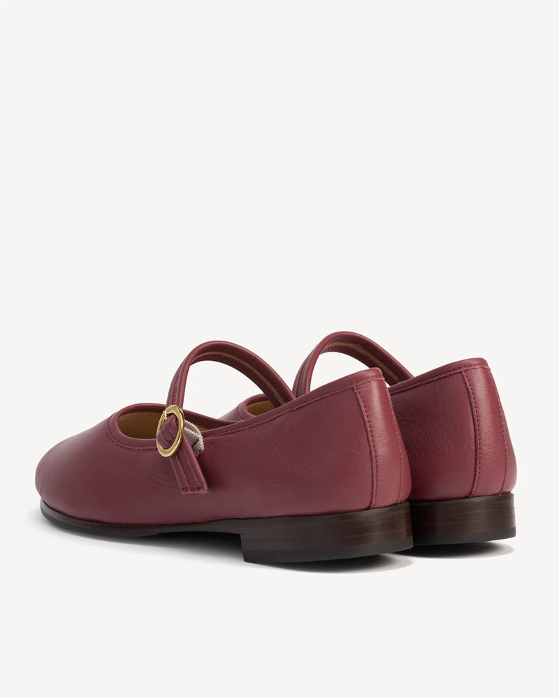 Back view of round-toe mary janes showing low stacked heels. The Modern-Day Mary Jane Compote. Sizes 5–12, wide available.