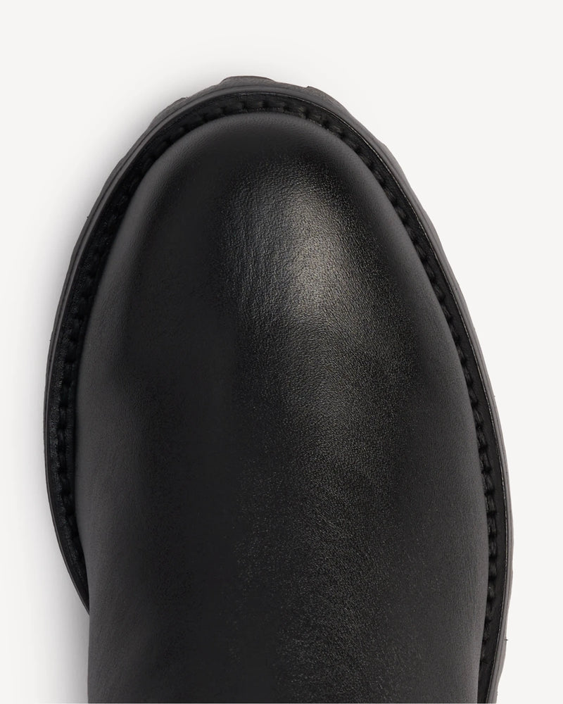 Close-up of the leather toe and lug sole. The On Tread Chelsea Boot Black Water Resistant. Sizes 5–12, wide available.