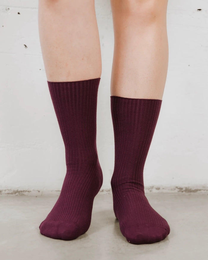 Front view of ribbed mid-calf socks, cotton-rich rib knit with a folded cuff. The Ribbed Crew Sock Cassis.