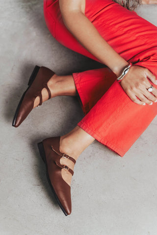 Pointed-toe flat with two thin buckle straps. The Editorial Mary Jane 2.0 French Press. Sizes 5–12, wide available.
