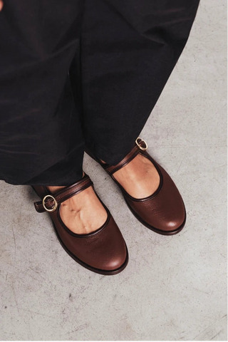 Side view of round-toe flat with single buckle strap. The Today Mary Jane French Press. Sizes 5–12.