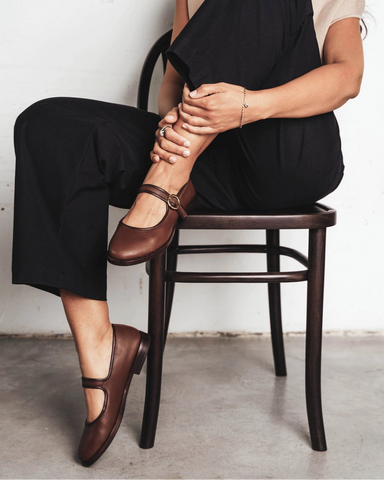 Side view of round-toe flat with single buckle strap. The Today Mary Jane French Press. Sizes 5–12.