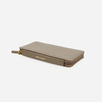 The Flying Solo Passport Holder Truffle Micro Pebble