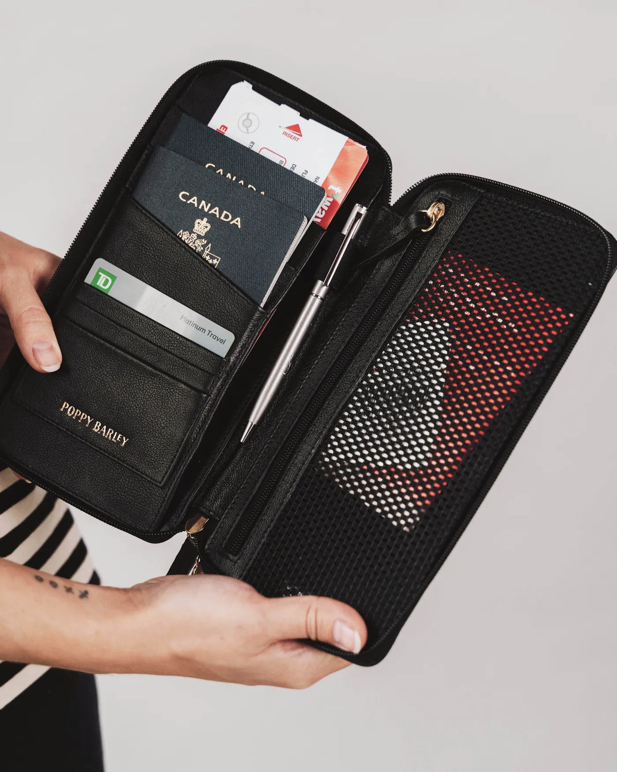 The Flying Solo Passport Holder Black Micro Pebble