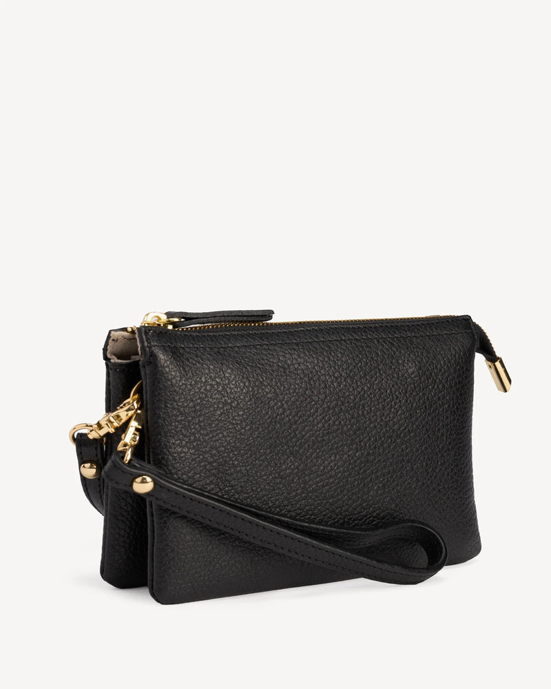 Pebbled-leather wristlet folded with wrist strap and gold zipper pull. The 3-in-1 Wristlet Black.