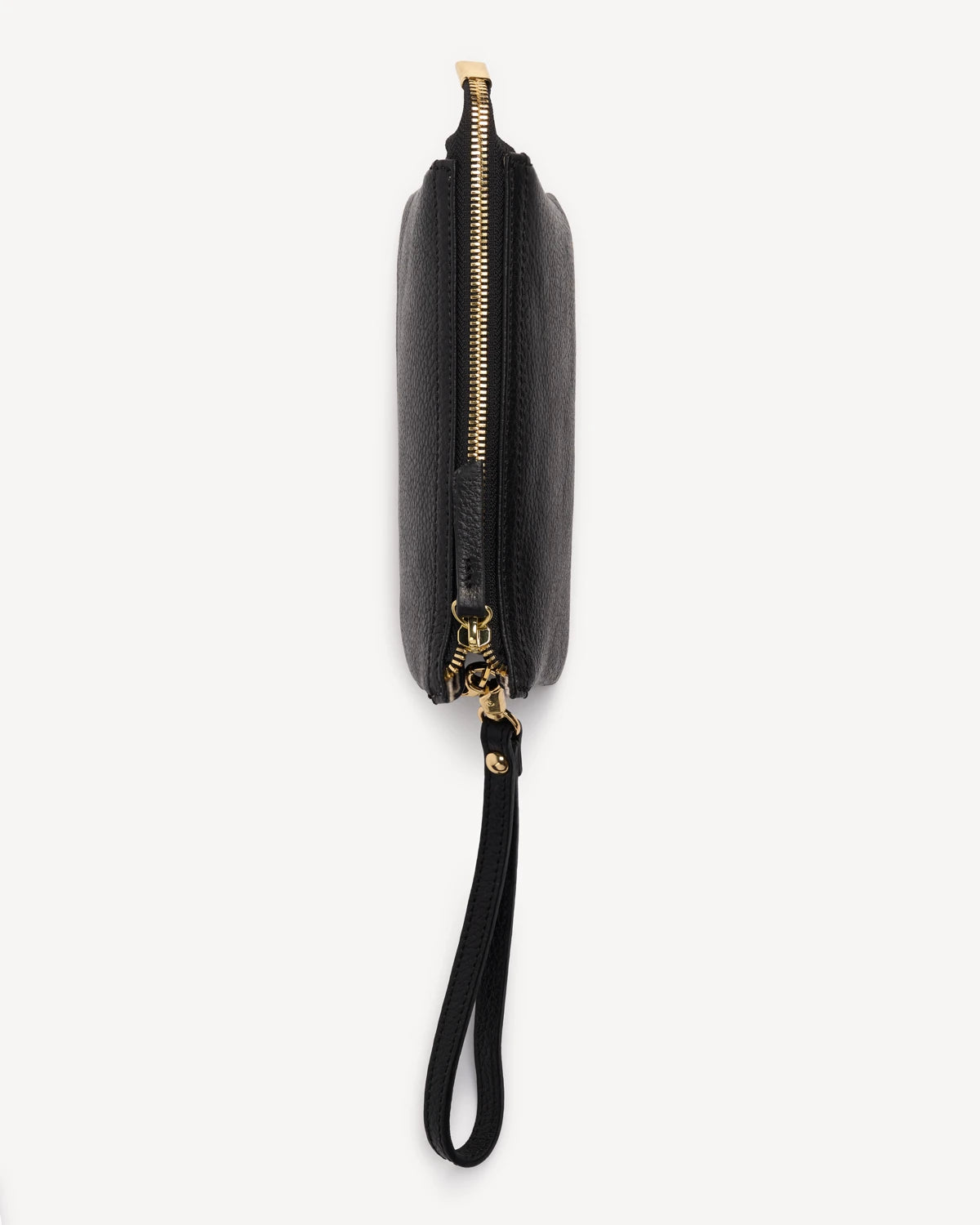 Side profile of the pebbled-leather wristlet showing zipper trim. The 3-in-1 Wristlet Black.
