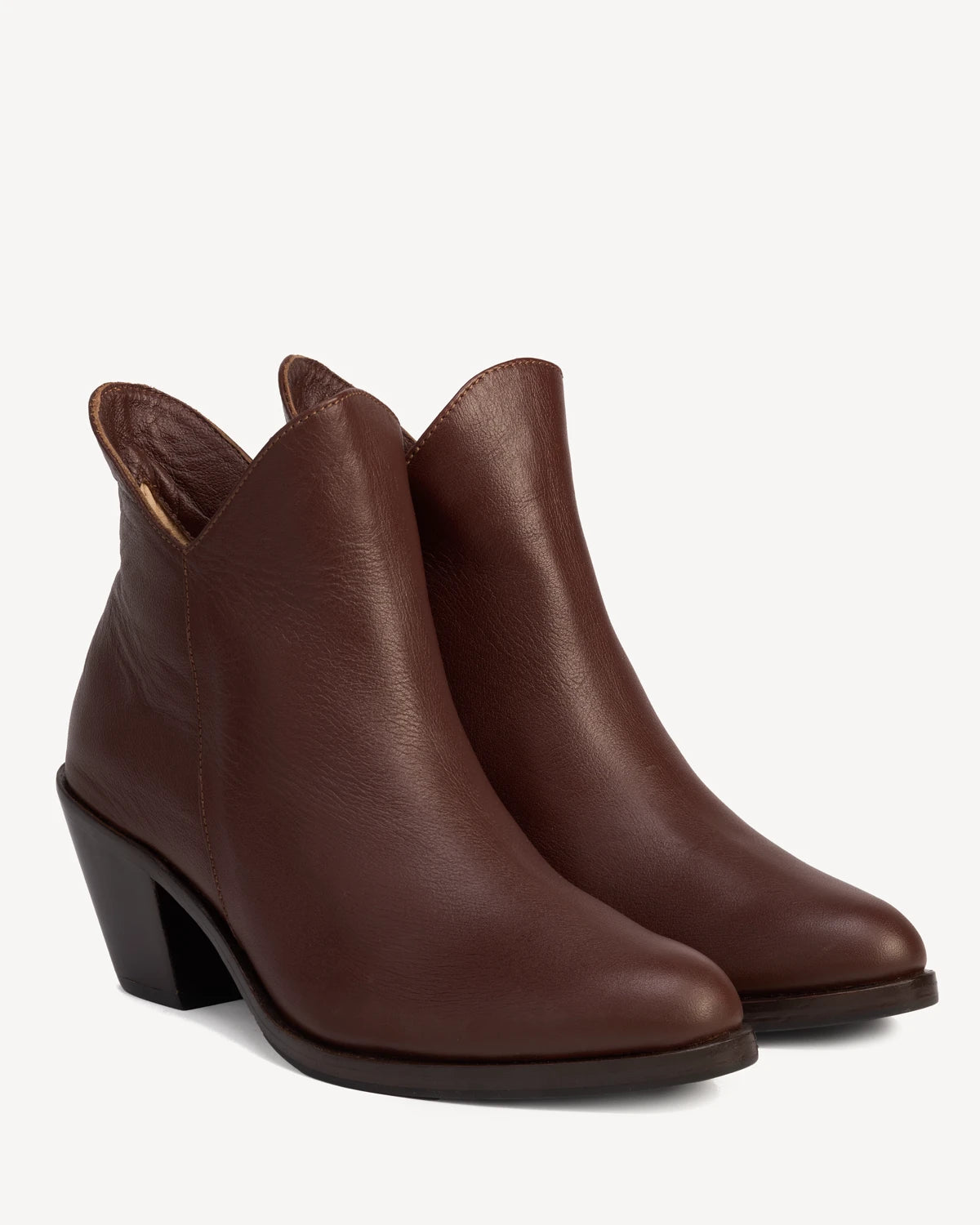 Pull-on ankle boots with notched topline, angled. The Two Point Five Ankle Boot French Press. Sizes 5–12, wide available.