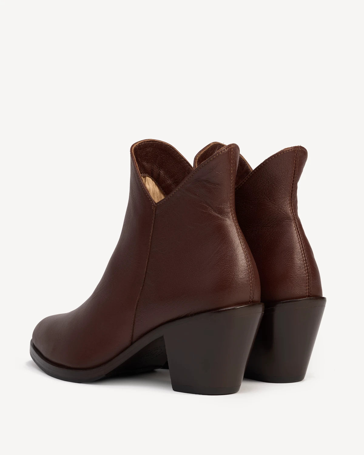 Back view of pull-on ankle boots showing block heels. The Two Point Five Ankle Boot French Press. Sizes 5–12, wide available.
