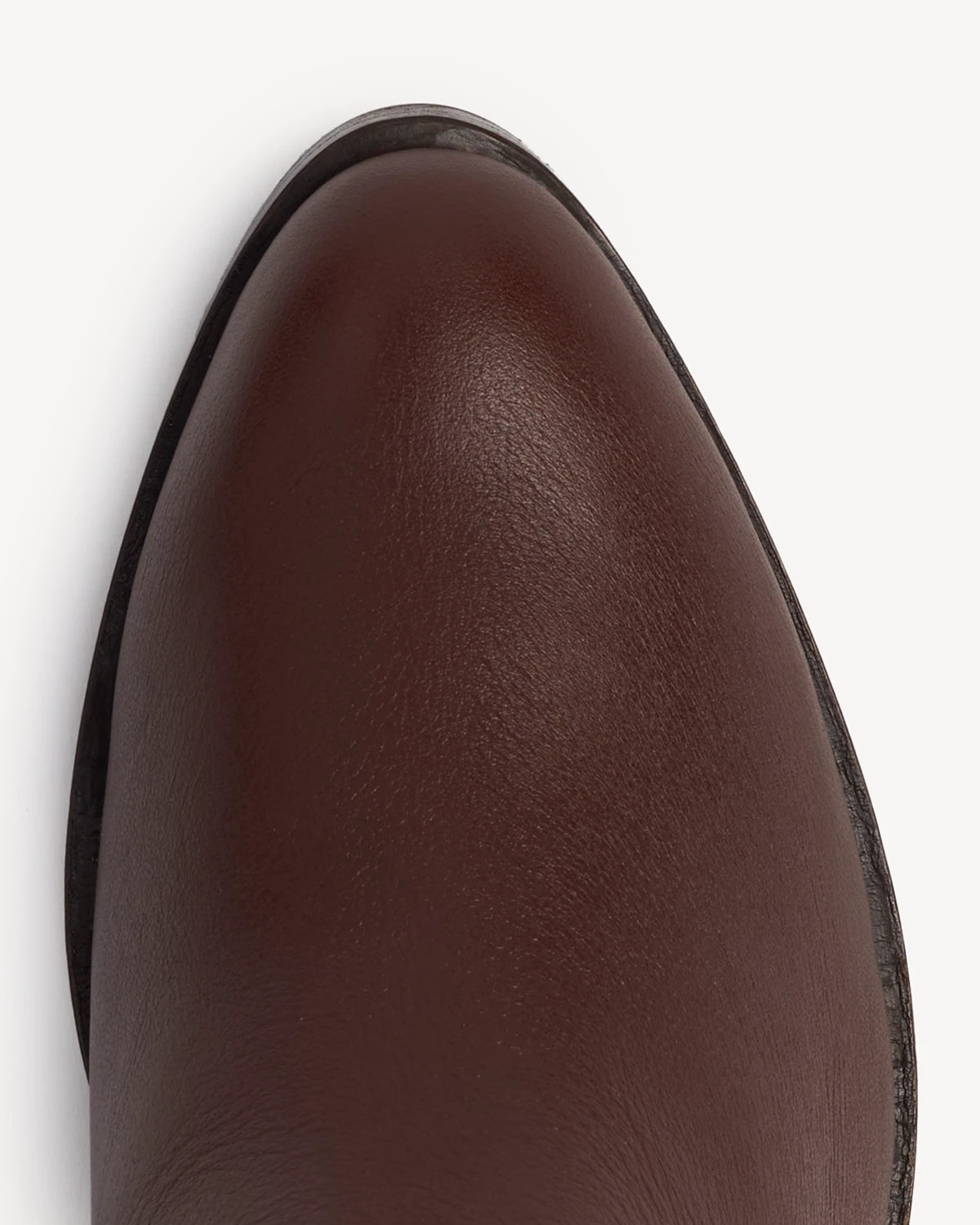Close-up of the rounded toe on a pull-on ankle boot. The Two Point Five Ankle Boot French Press. Sizes 5–12, wide available.